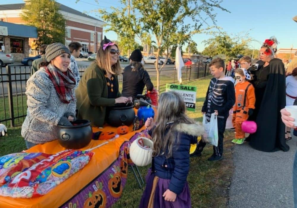 the Southern Real Estate team handing out Halloween candy