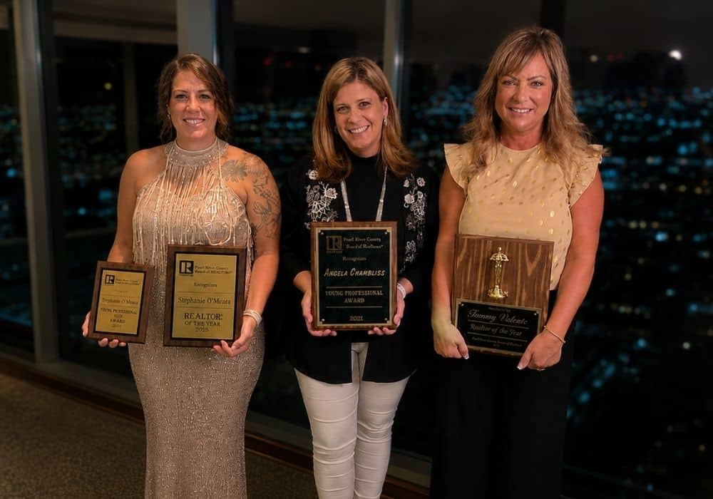 the Southern Real Estate team holding their awards